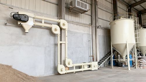 Application réussie des convoyeurs à chaîne tubulaires dans la manutention des matériaux environnementaux